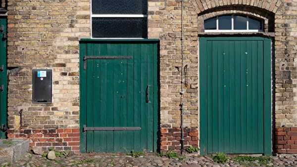 Green doors on agricultural building